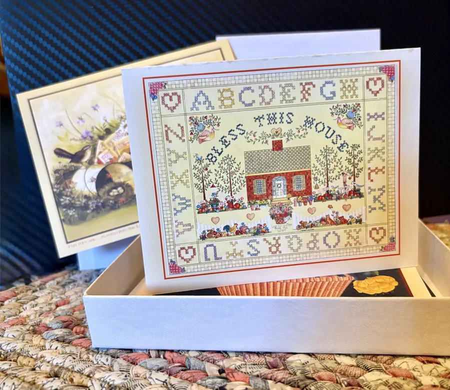 A box of Ellen Stouffer note cards, Bless This House on top